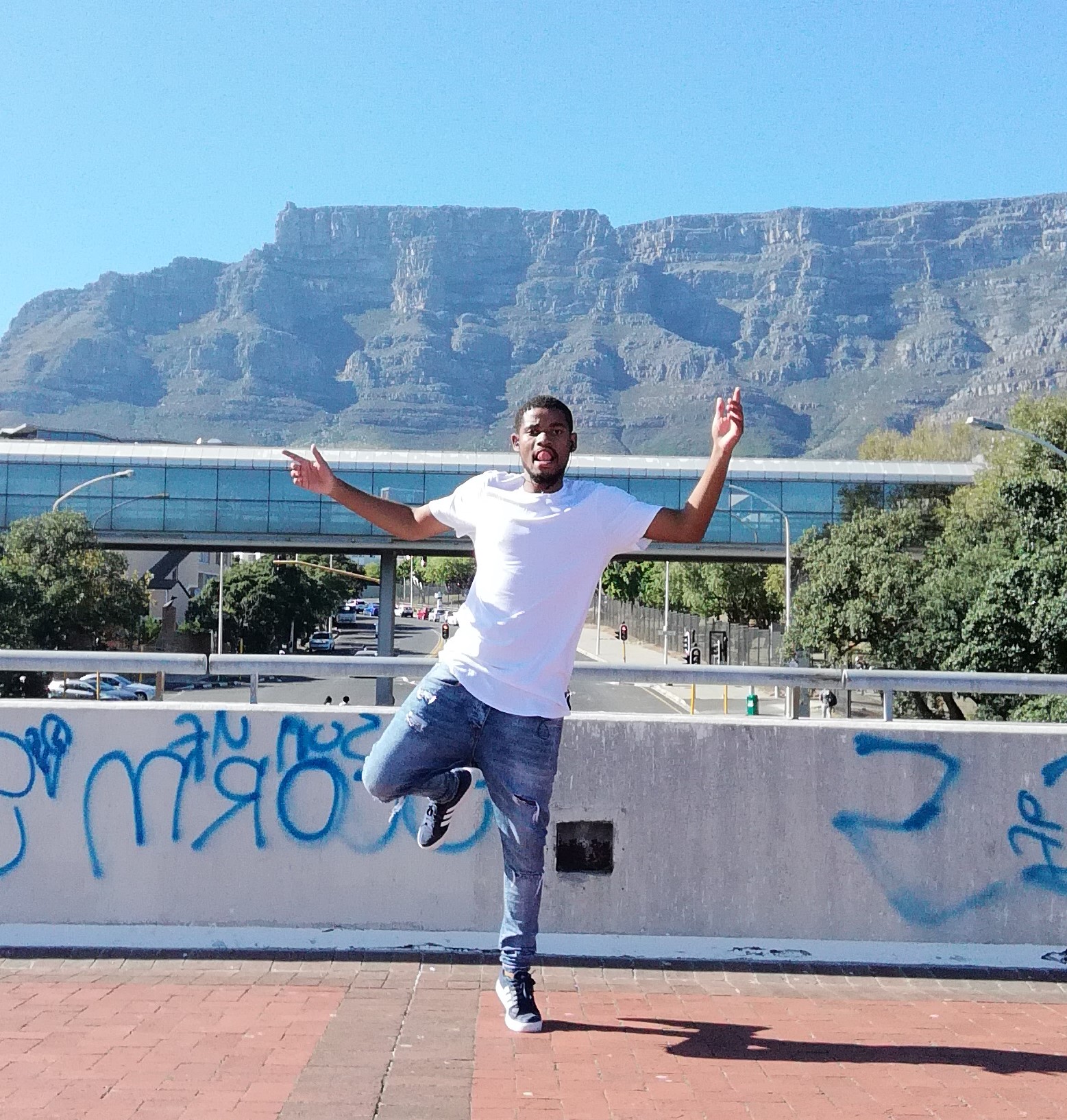 Person with a Table Mountain background